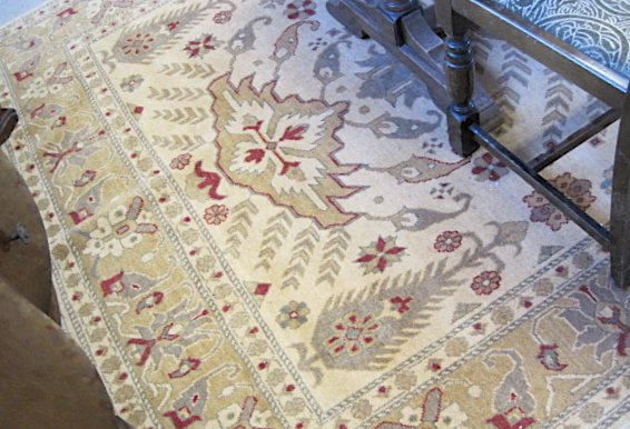 Appraisal: HAND KNOTTED ORIENTAL CARPET Pakistani Zeigler floral and central floral