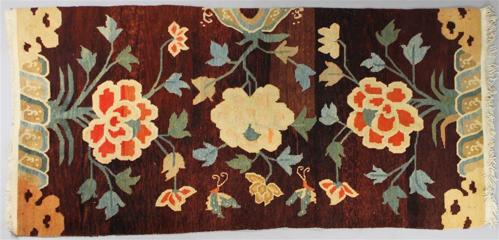 Appraisal: TWO TIBETAN FLORAL WOOL RUGS both of floral design one