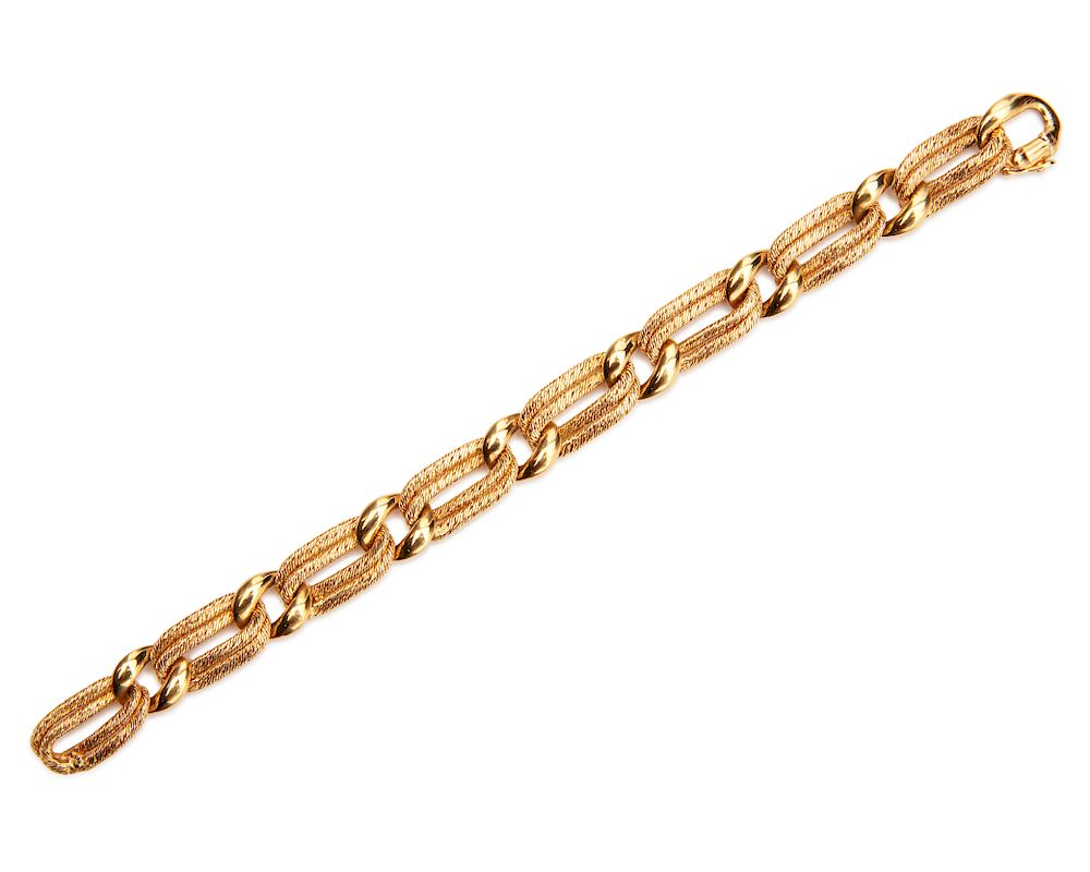 Appraisal: K Gold Bracelet K Gold Bracelet French of textured oval