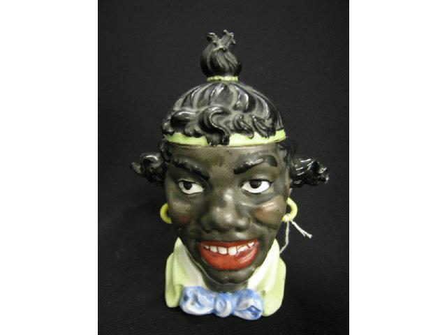 Appraisal: Black Americana Figural Porcelain Tobacco Jar girl with earrings tall