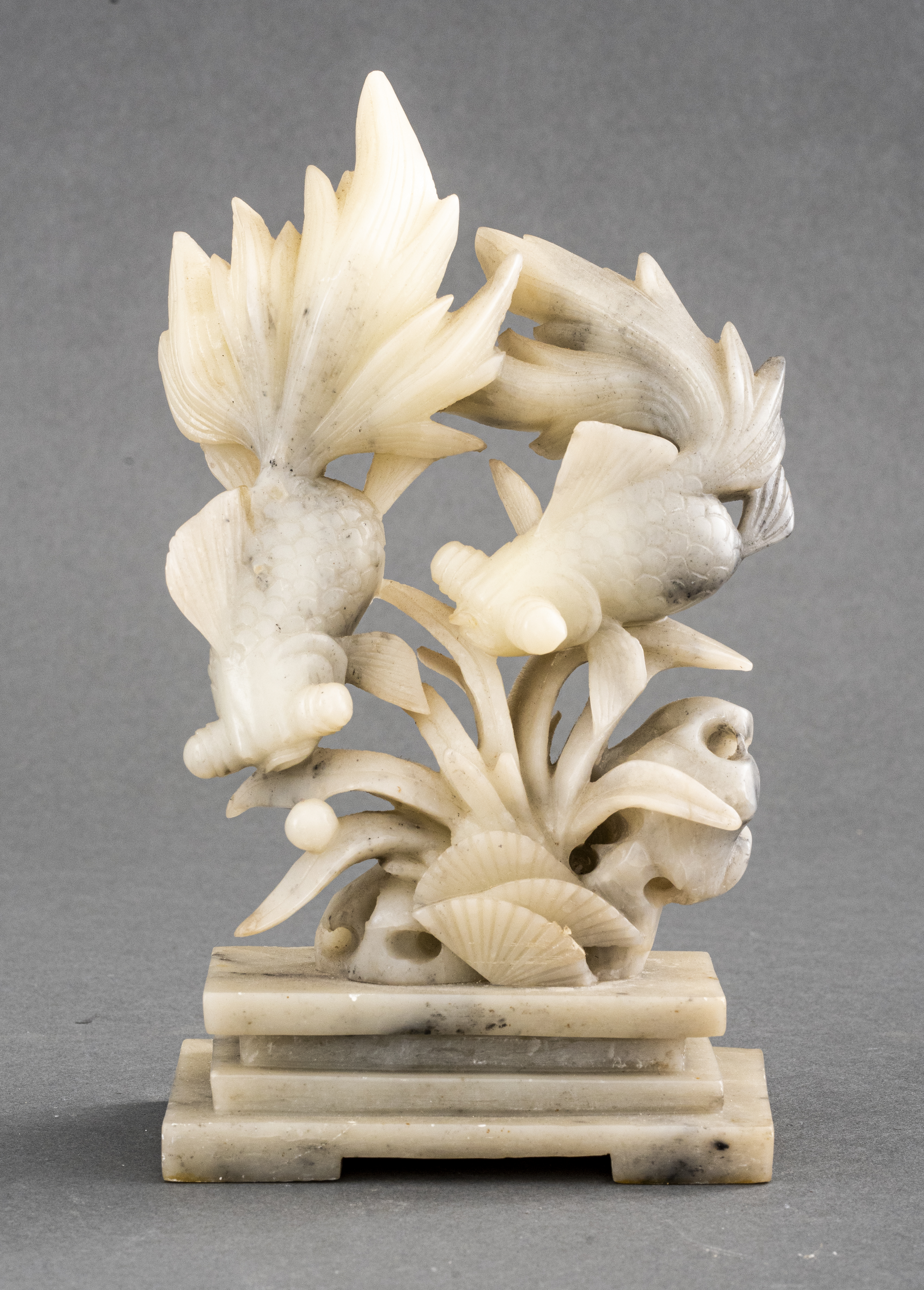 Appraisal: CHINESE CARVED SOAPSTONE SCULPTURE OF KOI FISH Chinese carved soapstone