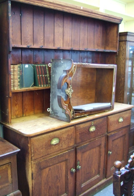 Appraisal: A th century pine dresser the enclosed two tier plate