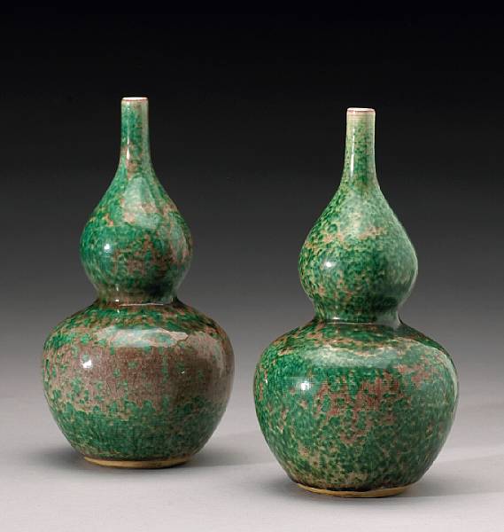 Appraisal: A pair of porcelain double gourd vases with mottled red