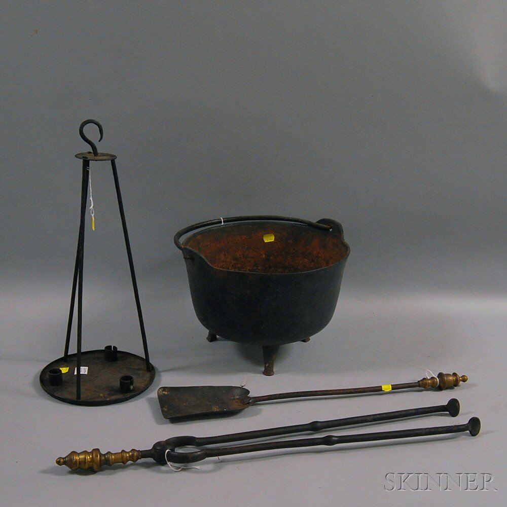 Appraisal: Four Iron Hearth and Lighting Items a pair of cast