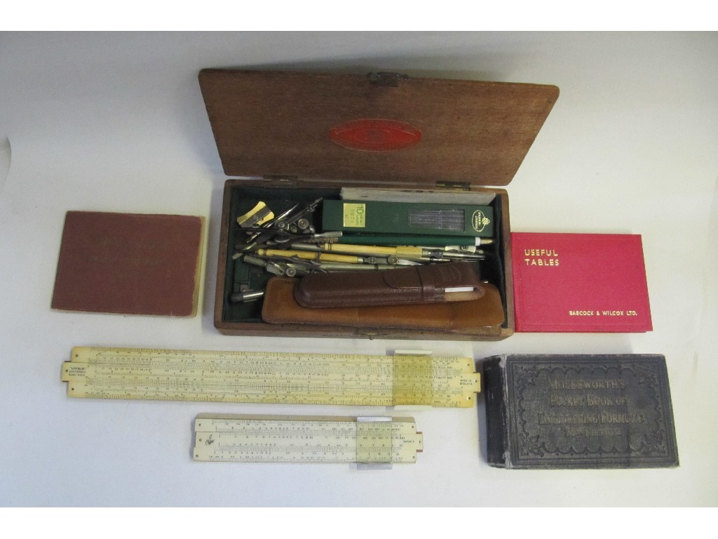 Appraisal: Lot comprising drawing instruments slide rules and engineer's pocket books