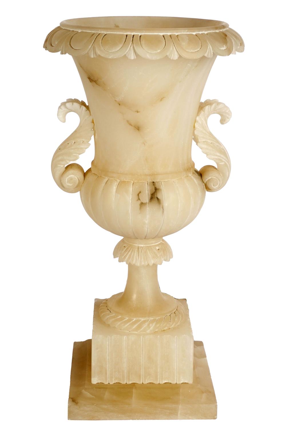 Appraisal: CARVED ALABASTER URN-FORM TABLE LAMPthe interior fitted with a single