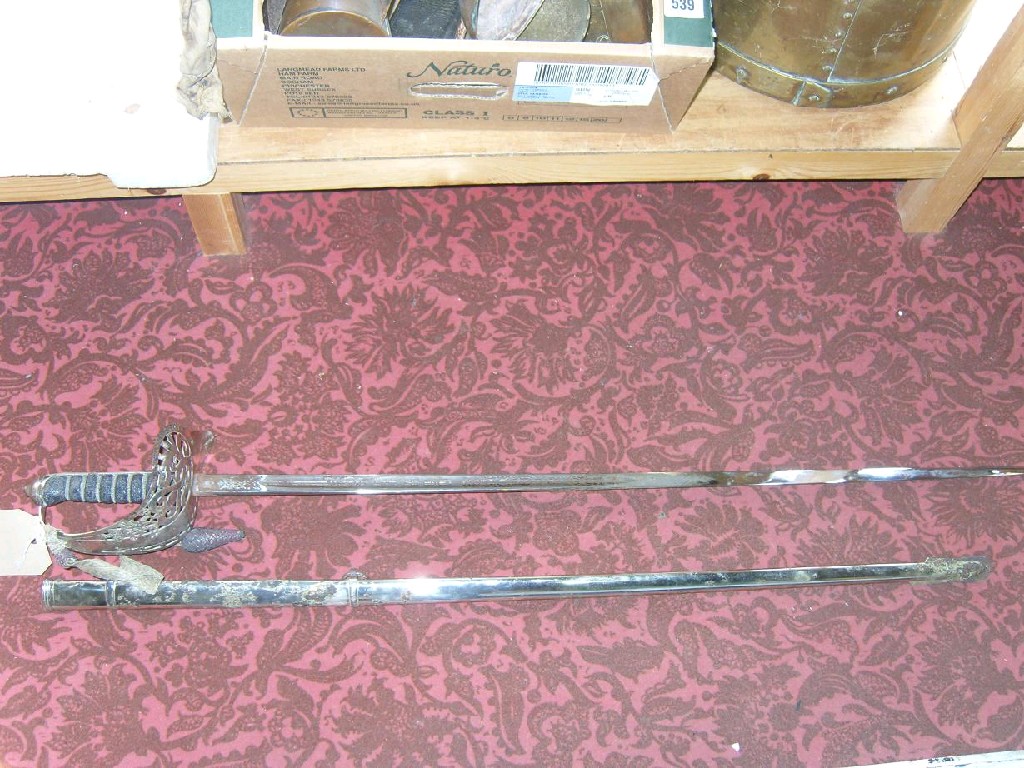 Appraisal: An infantry officers sword and scabbard pattern with plated mount