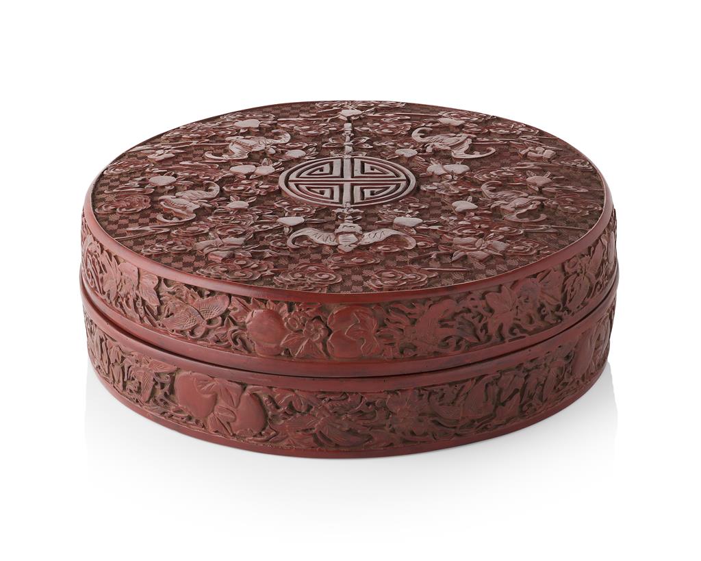 Appraisal: CARVED CINNABAR LACQUER CIRCULAR BOX AND COVER the cover crisply