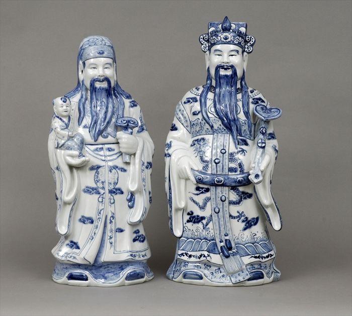 Appraisal: Two Chinese Blue and White Porcelain Figures of Noblemen