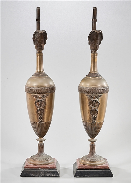 Appraisal: Pair of slender bronze Classical-style vessels with handles each with