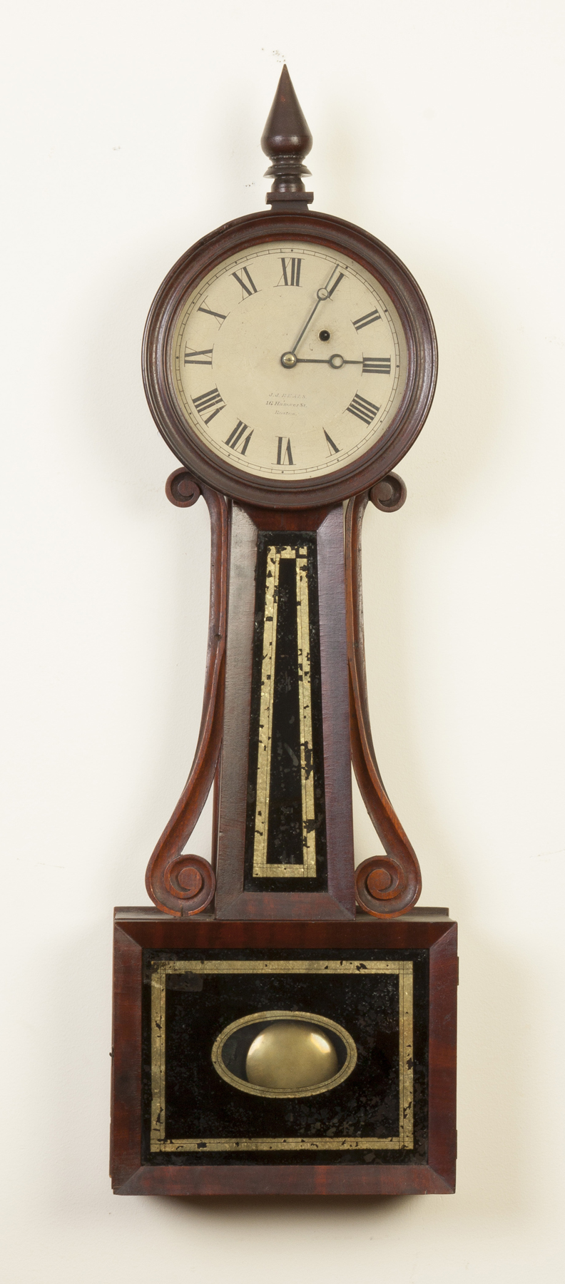 Appraisal: J J Beals Boston Banjo Clock Mahogany case with carved