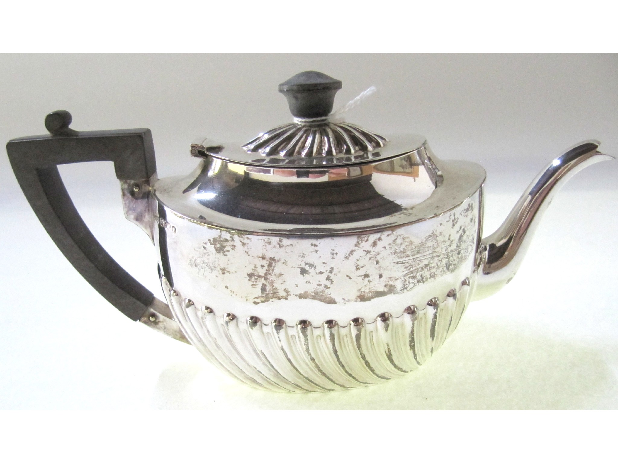 Appraisal: A small silver teapot Sheffield