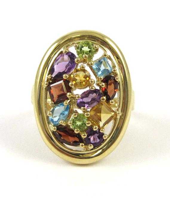 Appraisal: MULTI COLOR GEMSTONE AND TEN KARAT GOLD RING The yellow