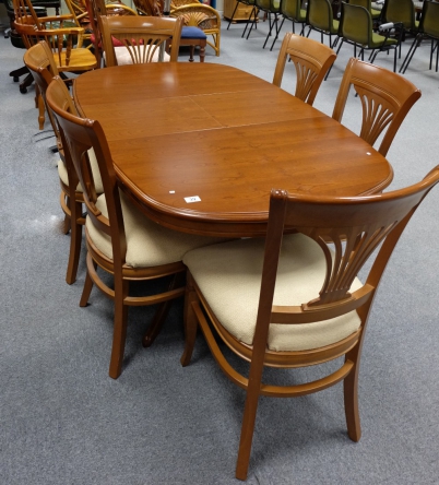 Appraisal: Reproduction teak wood extending dining table with pop up leaf