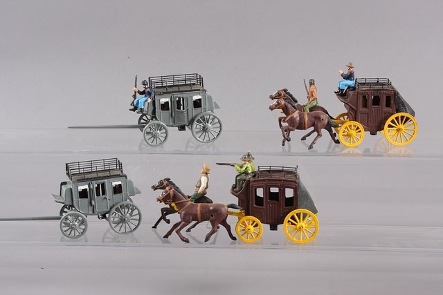 Appraisal: Lot of metal western stage coaches with horses and figures