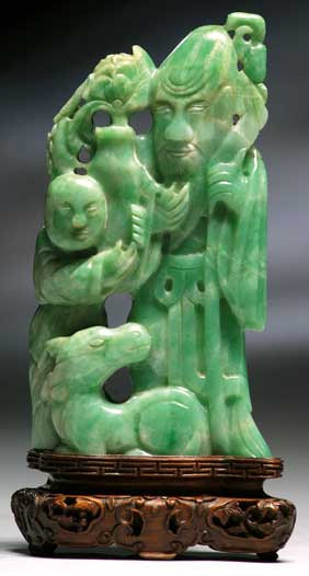 Appraisal: ANTIQUE APPLE GREEN JADEITE GROUP Chinese carved jadeite figural group