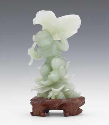 Appraisal: A Celadon Jade Statuette Nicely carved and polished depicting a