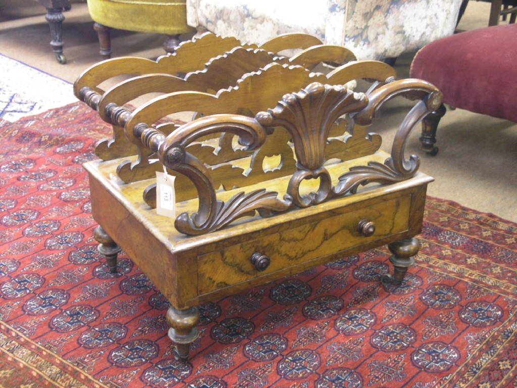 Appraisal: A Victorian walnut Canterbury the three divisions between a carved