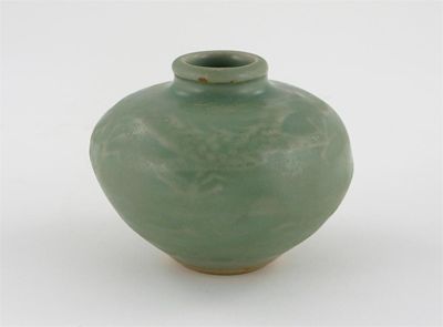 Appraisal: A small Chinese celadon ovoid vase the shoulder moulded with