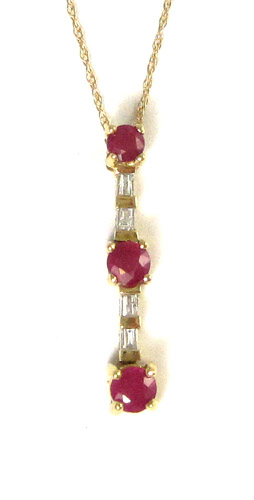 Appraisal: RUBY AND DIAMOND PENDANT NECKLACE suspended on an inch k