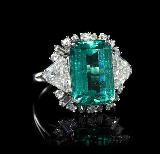 Appraisal: An Important Platinum Emerald and Diamond Ring containing one octagonal