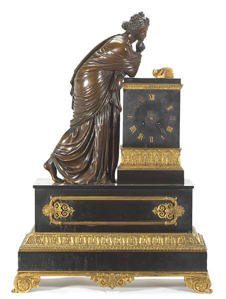 Appraisal: A Napoleon III patinated gilt bronze mounted black marble figural