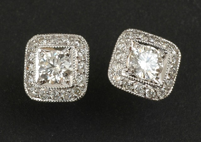 Appraisal: A pair of diamond earrings Each square cluster set with