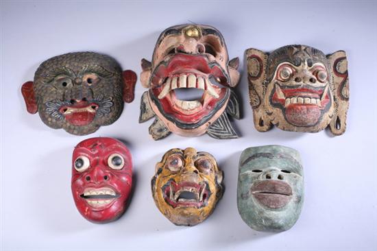 Appraisal: SIX INDONESIAN POLYCHROME WOOD MASKS - Largest in long