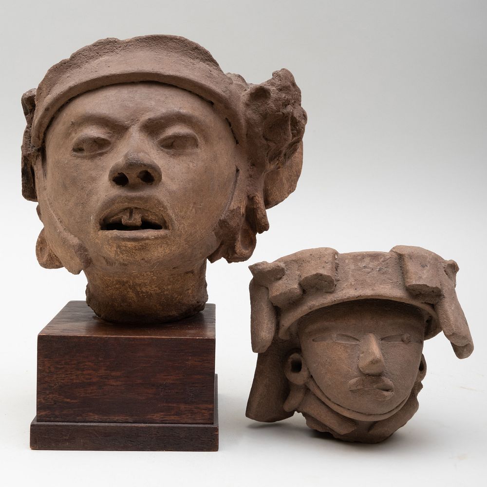 Appraisal: Two Pre-Columbian Terracotta Heads Veracruz One raised on stand The