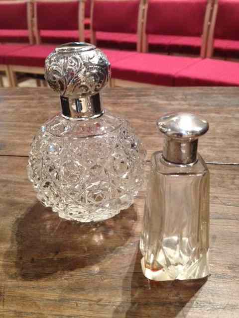 Appraisal: Two silver and moulded glass perfume bottles each one individually