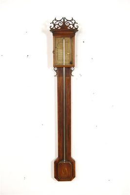 Appraisal: An early th century mahogany stick barometer with a pierced