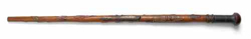 Appraisal: American carved and polychrome decorated cane with relief decorated shaft