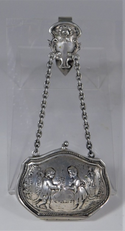 Appraisal: CONTINENTAL SILVER CHATELAINE PURSE Europe th CenturyRepousse decorated with a