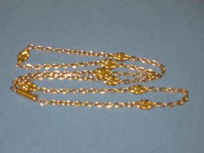 Appraisal: A FANCY CT GOLD CHAIN NECKLACE the oval links interspersed