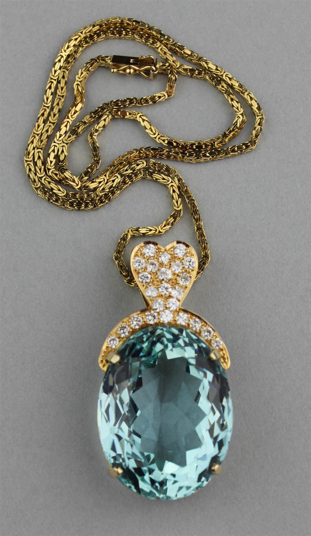 Appraisal: CARAT AQUAMARINE PENDANT WITH DIAMONDS IN K YELLOW GOLD ON