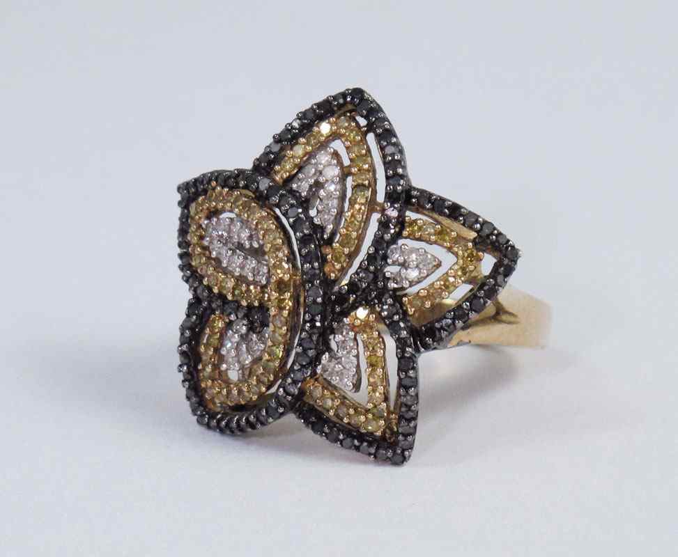 Appraisal: YELLOW BLACK AND WHITE DIAMOND STAR K GOLD RING K