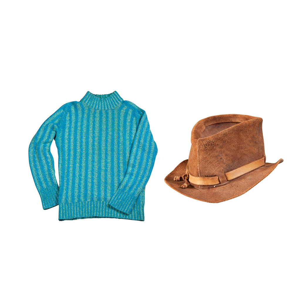 Appraisal: Sweater and Hat The turquoise and cream cable knit mock