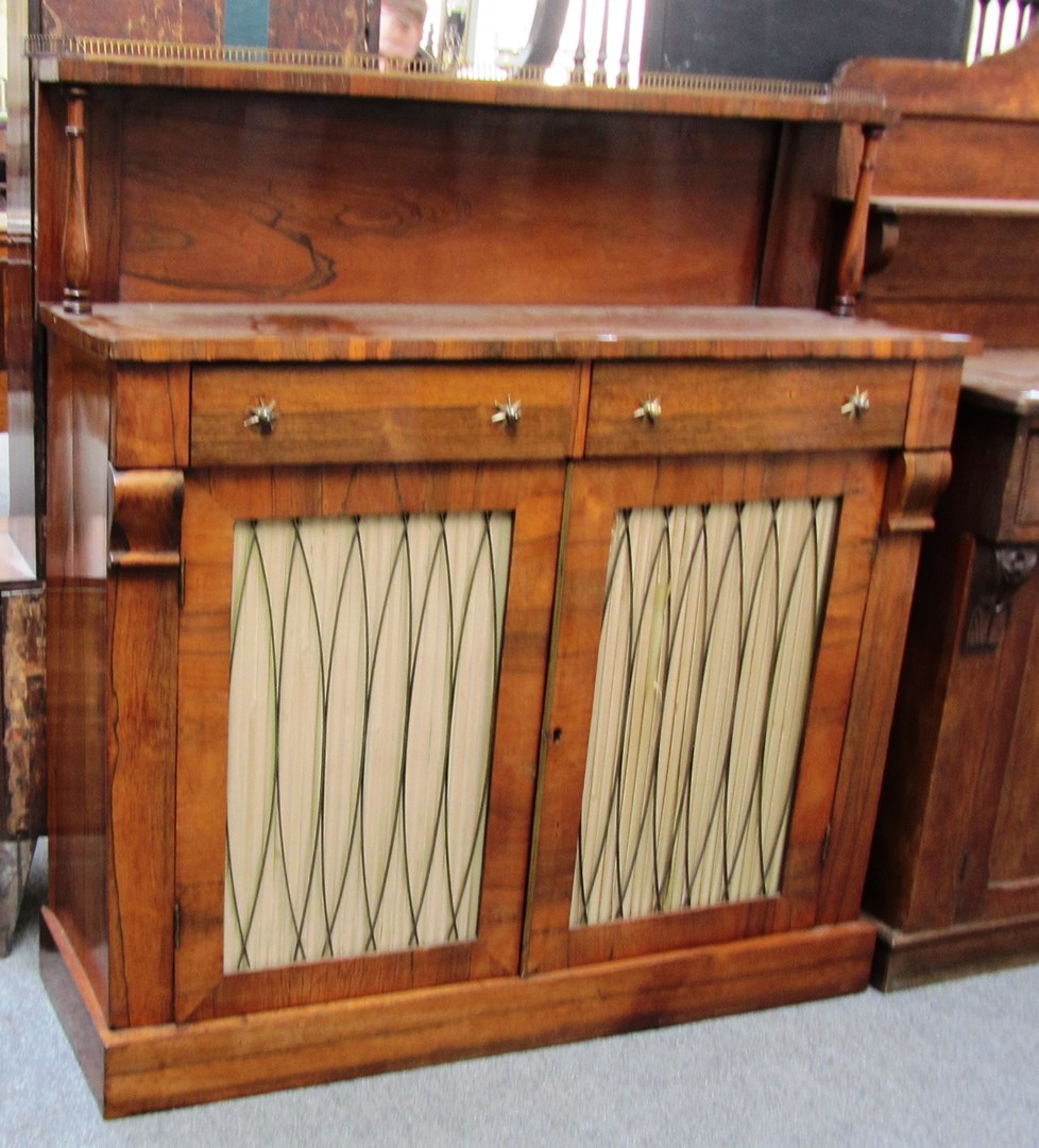 Appraisal: An early th century rosewood shelf back chiffonier on plinth