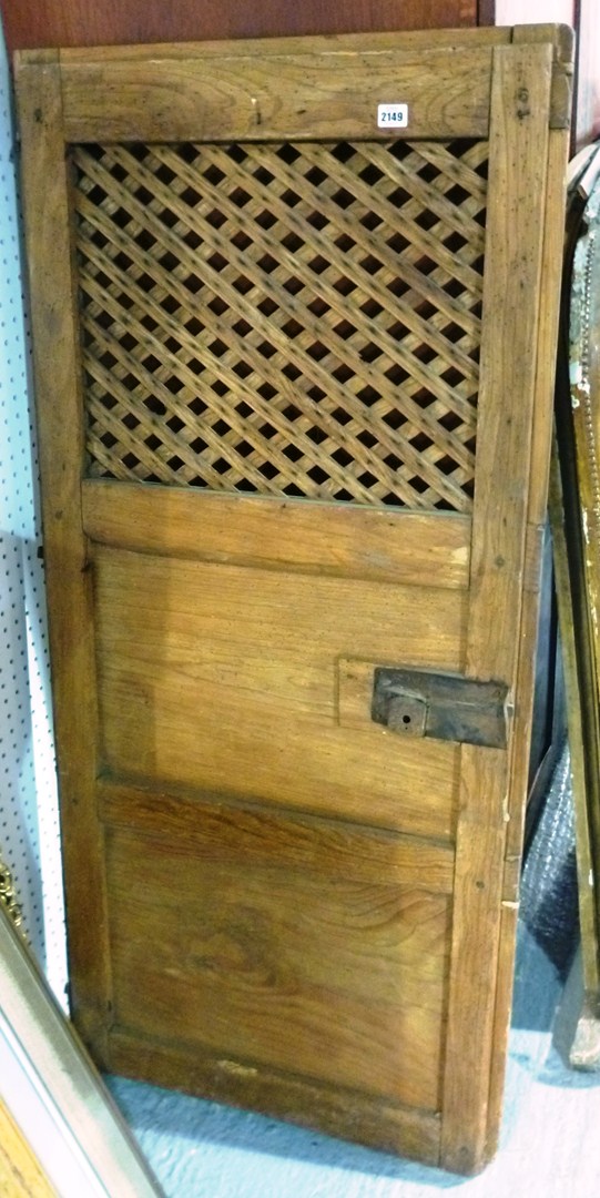 Appraisal: A hardwood screen with two lattice panels