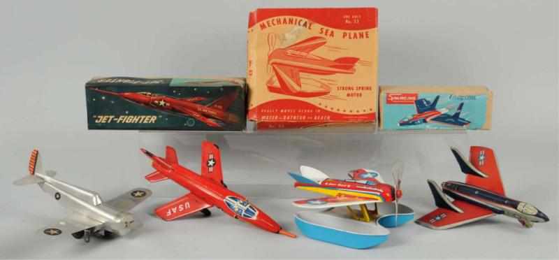 Appraisal: Lot of Tin Airplane Wind-Up Friction Toys Working Includes one