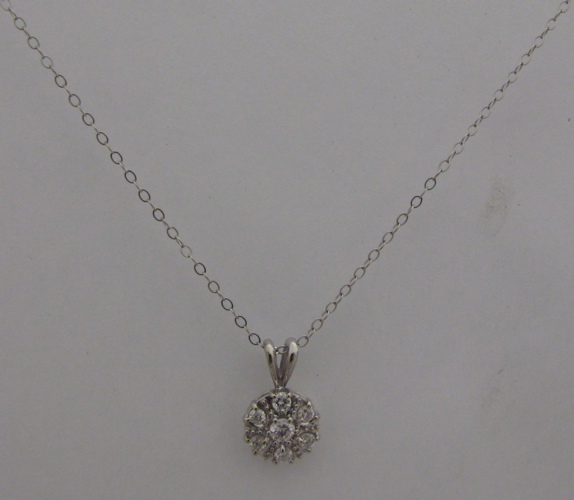 Appraisal: DIAMOND AND K WHITE GOLD PENDANT NECKLACE the pendant is