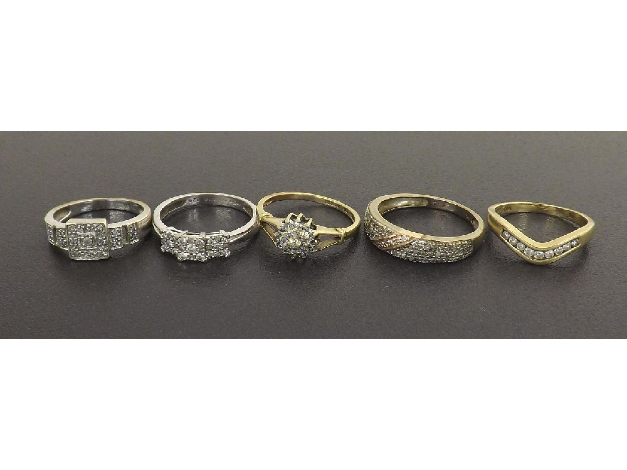 Appraisal: Five ct diamond set rings gm