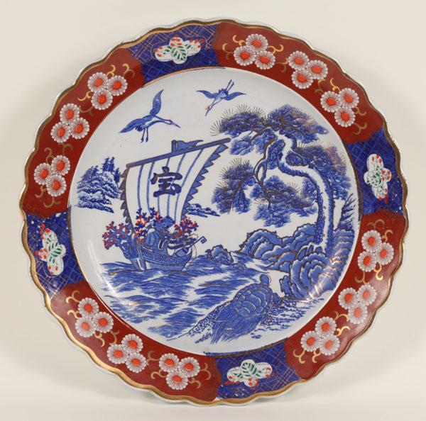 Appraisal: Japanese Imari porcelain charger with gilt and floral border center