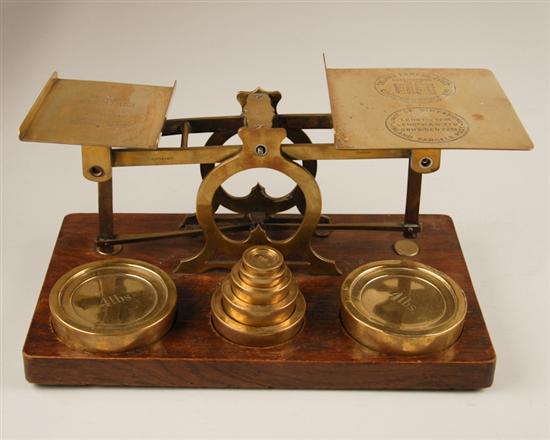 Appraisal: A th C English Brass Postal Scale mounted on a