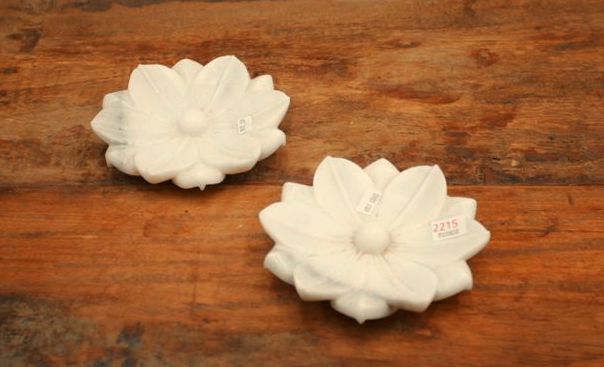 Appraisal: A pair of hand carved white marble bowls carved as