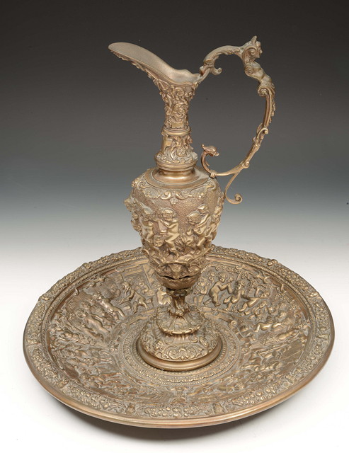 Appraisal: A TH CENTURY CONTINENTAL BRONZE EWER with scrolling handle in