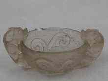 Appraisal: A Chinese rock crystal cup carved with mythical animals as