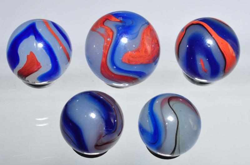 Appraisal: Lot of Akro Agate Blue Oxblood Marbles Description Marbles show