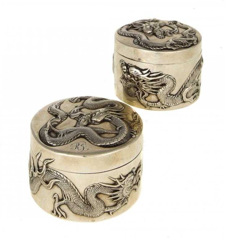 Appraisal: TWO CHINESE EXPORT SILVER GRADUATED CYLINDRICAL REPOUSS BOXES AND COVERS