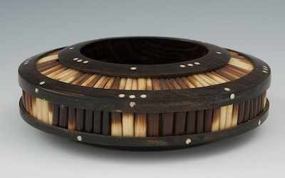 Appraisal: An Ebonised Rosewood and Porcupine Quill Footed Bowl Of circular